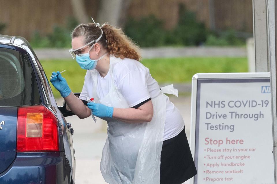 A coronavirus testing site in a car park at Chessington World of Adventures: PA