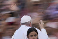 Pope Francis arrives in St. Peter's Square at the Vatican for the participants into the World Meeting of Families in Rome, Saturday, June 25, 2022. The World Meeting of Families was created by Pope John Paul II in 1994 and celebrated every three years since then in different cities. (AP Photo/Andrew Medichini)