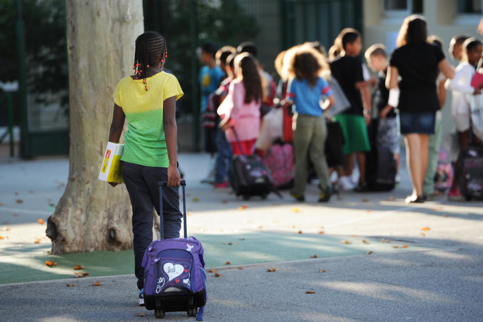 Kids going back to school. Getty Images