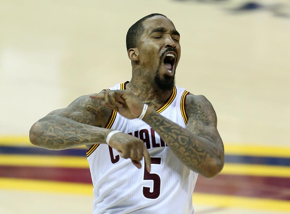 Cleveland Cavaliers guard J.R. Smith (5) celebrates a basket against the Golden State Warriors during the second half of Game 6 of basketball's NBA Finals in Cleveland, Thursday, June 16, 2016.