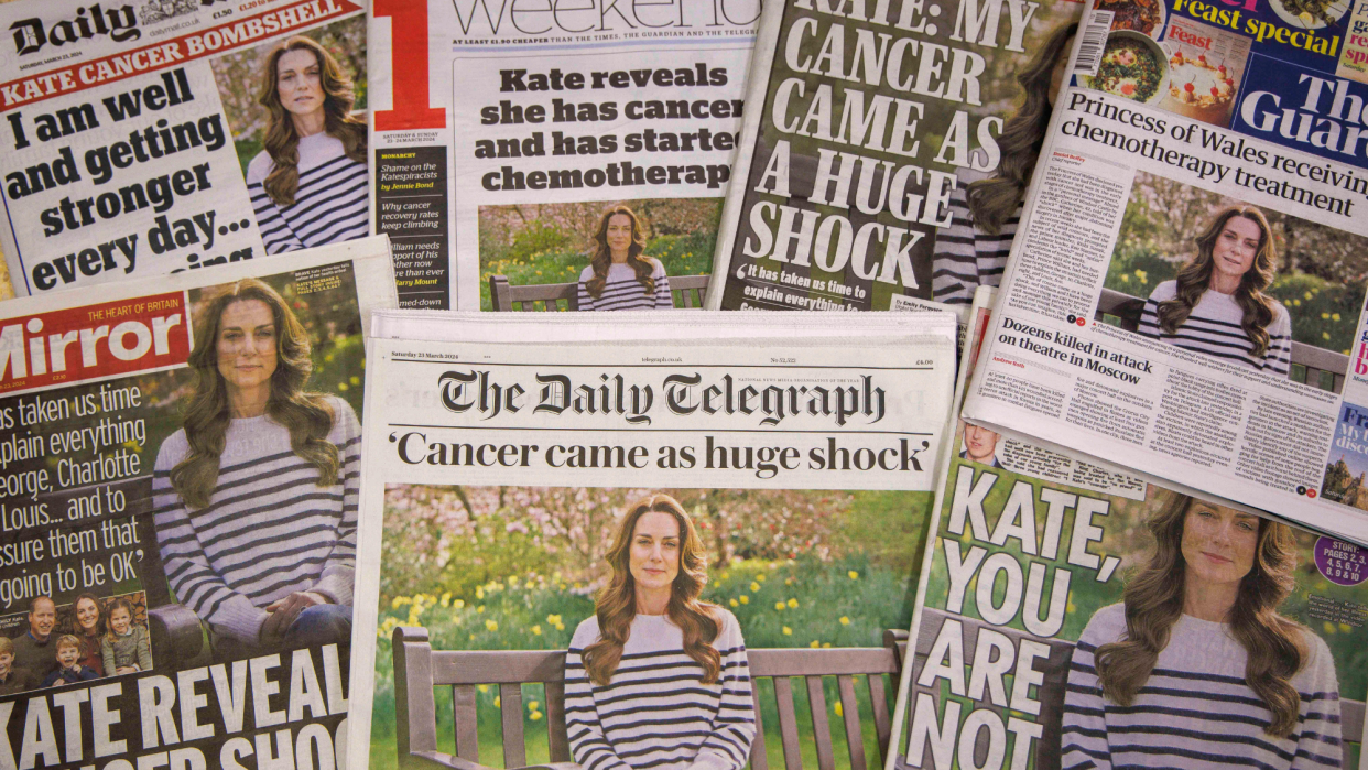  A stack of British newspaper front pages sharing the news of Kate Middleton's cancer diagnosis. 