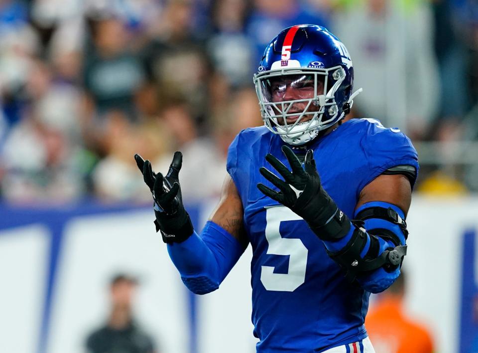 New York Giants linebacker Kayvon Thibodeaux (5) reacts to nearly intercepting Seattle Seahawks quarterback Geno Smith (not pictured) in the first half at MetLife Stadium on Monday, Oct. 2, 2023, in East Rutherford.