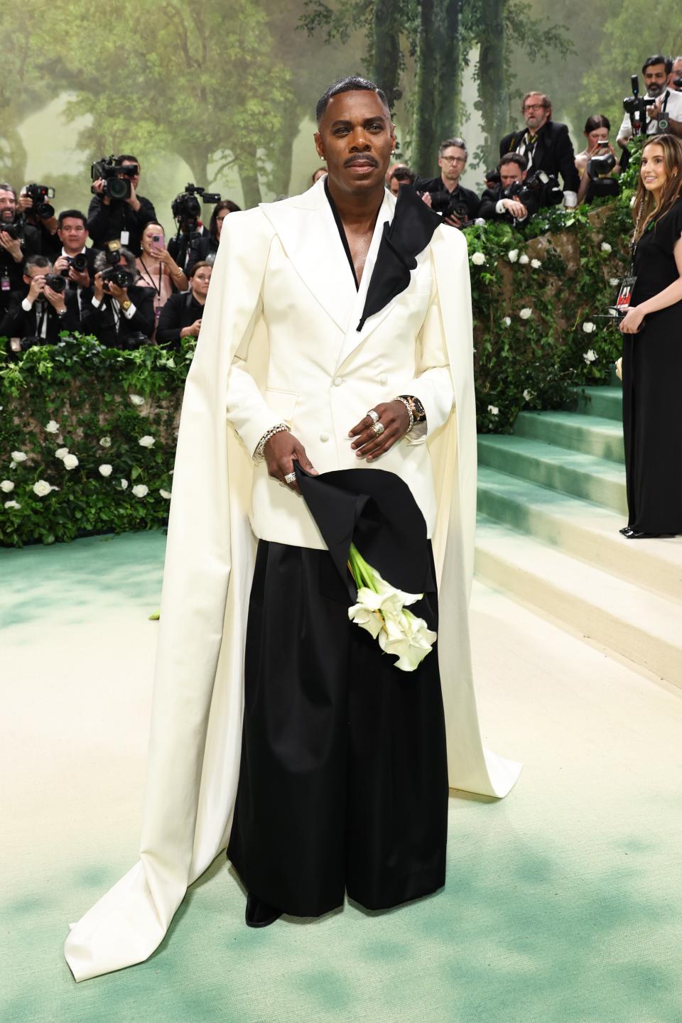 Colman Domingo in a unique white jacket with long tails and black trousers at the 2024 Met Gala