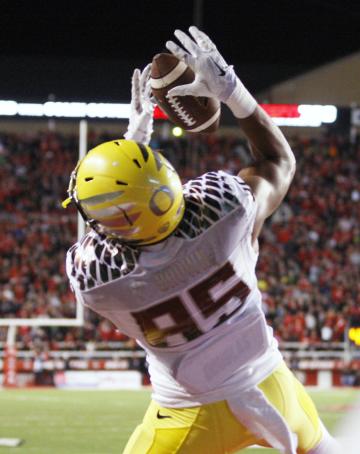 SALT LAKE CITY, UT - NOVEMBER 8: Tight end Pharaoh Brown #85 of the Oregon Ducks catches a touchdown pass against the Utah Utes during the first half of an NCAA football game November 8, 2014 at Rice-Eccles Stadium in Salt Lake City, Utah. (Photo by George Frey/Getty Images)