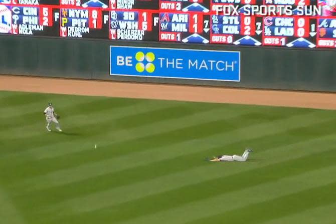 Rays right fielder Steven Souza (right) takes a dive about 20 feet away from the baseball. (MLB.TV)