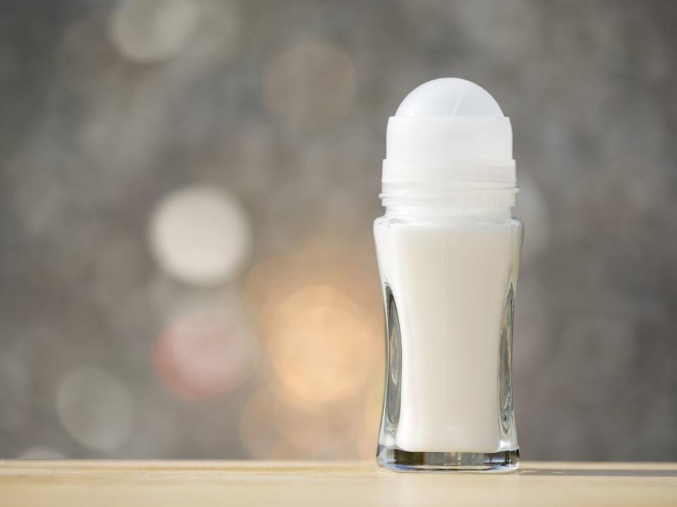 roll on deodorant, close up, in glass jar, illuminated by sunlight