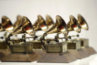 FILE - Grammy Awards are displayed at the Grammy Museum Experience at Prudential Center in Newark, N.J. on Oct. 10, 2017. The 66th annual Grammy Awards will take place Sunday, February 4 at the Crypto.com Arena in Los Angeles. (AP Photo/Julio Cortez, File)