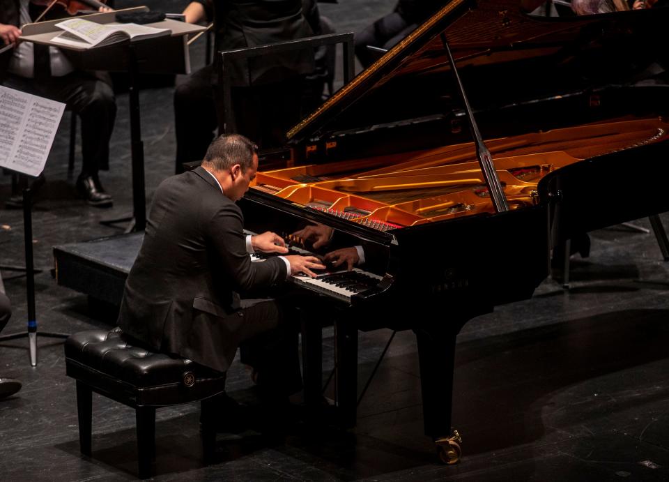 Jonathan Mamora performs Rachmaninoff’s Concerto No. 1 in F sharp minor during the Waring International Piano Competition at the McCallum Theatre in Palm Desert, Calif., Monday, April 18, 2022.