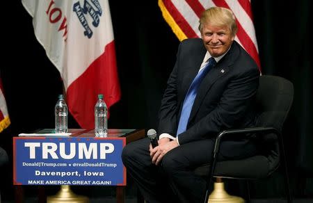 U.S. Republican presidential candidate Donald Trump waits to speak at a campaign town hall in Davenport, Iowa January 30, 2016. REUTERS/Rick Wilking