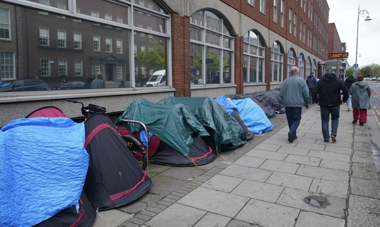 <span>Tents housing asylum seekers pitched near the International Protection Office in Dublin on Monday.</span><span>Photograph: Niall Carson/PA</span>