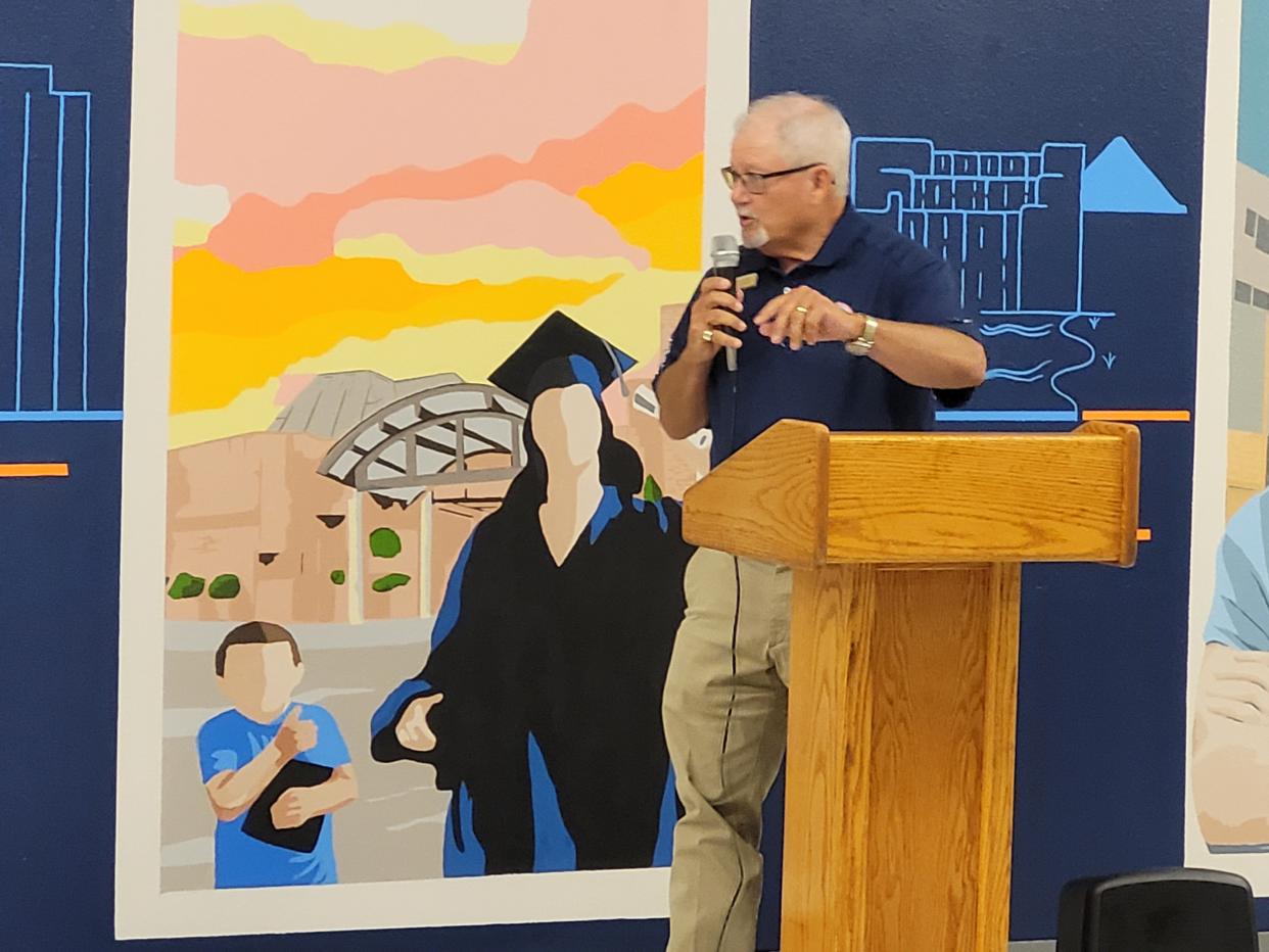 Vernon College President Dusty Johnston dedicates the new mural in the Vernon College student lounge.