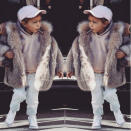 <p>In case you weren’t already aware, North West has more swag than you ever will. On Wednesday, Kim Kardashian posted a pic of her little girl on <a href="https://www.instagram.com/p/_6JMJuOSxd/" rel="nofollow noopener" target="_blank" data-ylk="slk:Instagram;elm:context_link;itc:0;sec:content-canvas" class="link ">Instagram</a>—captioned “Swag”—in a khaki sweatshirt (that looked like something hot off Kanye’s Yeezy collection), light denim jeans, Converse, a baseball cap and a larger-than-life fur coat. As if her look for a day out with Kourtney and P wasn’t sweet enough, she sucked on a lollipop too. <i>(Photo: <a href="https://www.instagram.com/p/_6JMJuOSxd/" rel="nofollow noopener" target="_blank" data-ylk="slk:@kimkardashian;elm:context_link;itc:0;sec:content-canvas" class="link ">@kimkardashian</a>/Instagram) </i></p>