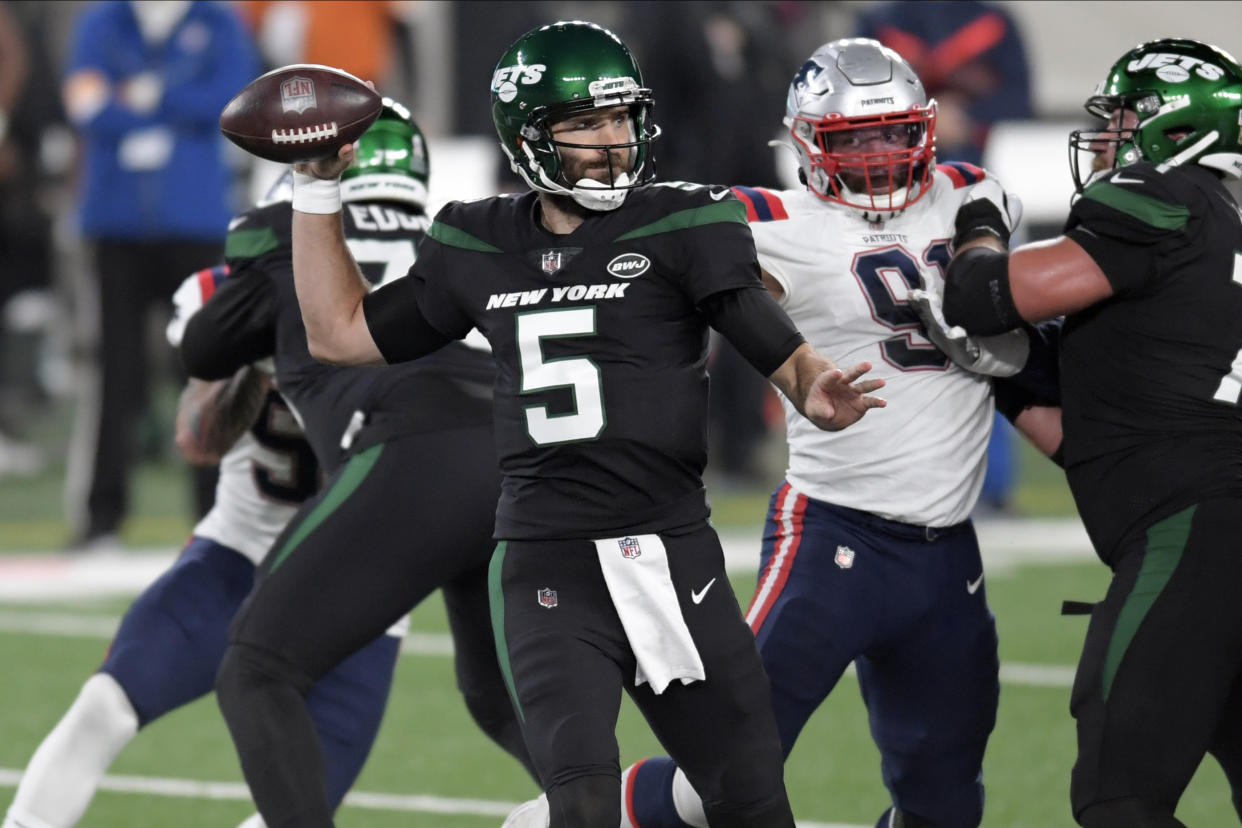 New York Jets quarterback Joe Flacco throws during the first half of an NFL football game against the New England Patriots, Monday, Nov. 9, 2020, in East Rutherford, N.J. (AP Photo/Bill Kostroun)