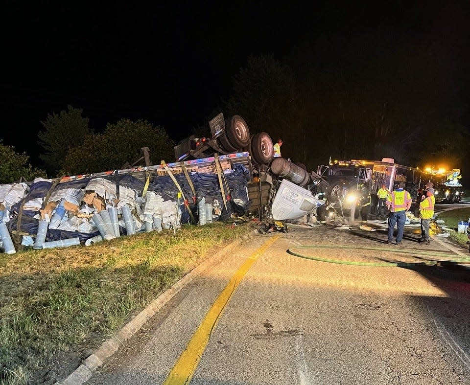 A tractor-trailer driver suffered minor injuries in a rollover crash on Monday that shut down a highway exit ramp in Hampton for six hours.