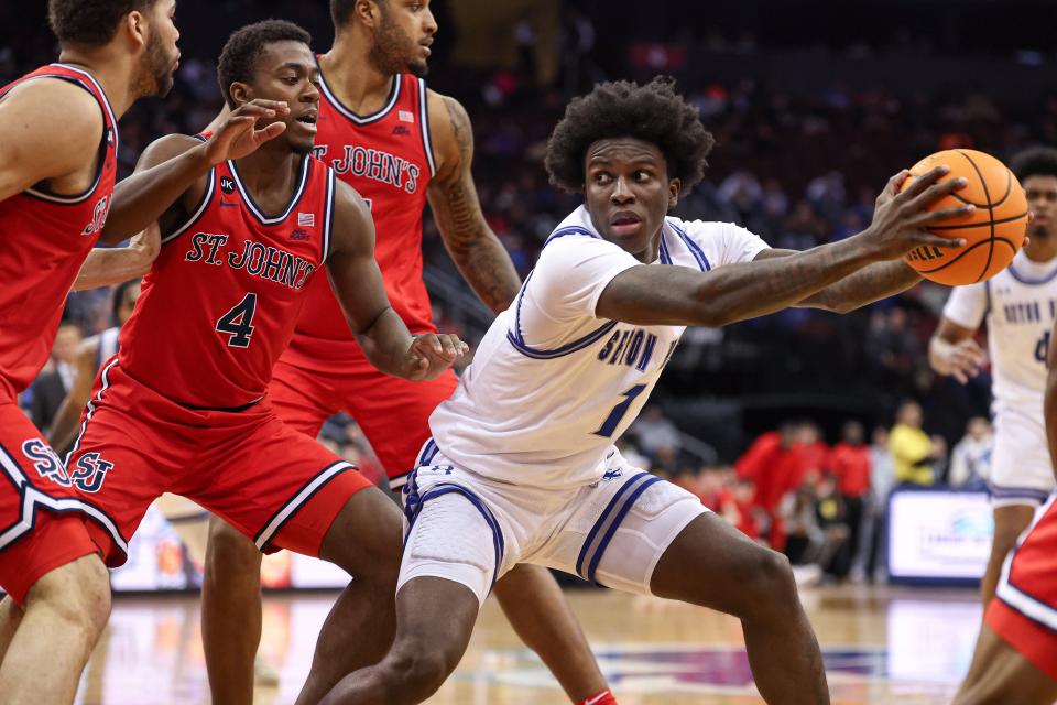 Jan 16, 2024; Newark, New Jersey, USA; Seton Hall Pirates guard Kadary Richmond (1) shields the ball from St. John's Red Storm guard Nahiem Alleyne (4) during the second half at Prudential Center. Mandatory Credit: Vincent Carchietta-USA TODAY Sports