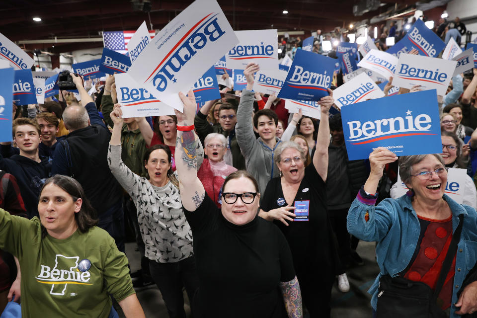 ESSEX JUNCTION, VERMONT - MARCH 03: Supporters cheer as primary election results are shown on television during a Super Tuesday night rally with Democratic presidential candidate Sen. Bernie Sanders (I-VT) at the Champlain Valley Expo March 03, 2020 in Essex Junction, Vermont. 1,357 Democratic delegates are at stake as voters cast their ballots in 14 states and American Samoa on what is known as Super Tuesday. (Photo by Chip Somodevilla/Getty Images)