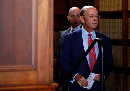 Commerce Secretary Wilbur Ross arrives to hold a news conference to make an announcement, after a background conference call with Commerce, Justice Department and Treasury Department officials at the Department of Commerce in Washington, U.S., March 7, 2017. REUTERS/Eric Thayer