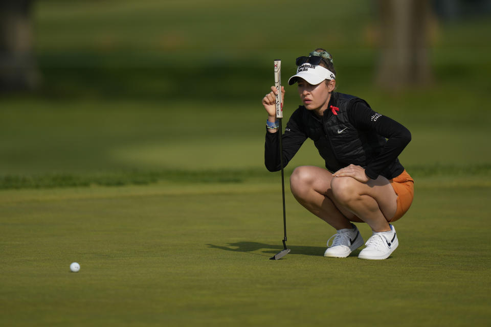 Nelly Korda lines up a shot on the first green during the first round of the LPGA Cognizant Founders Cup golf tournament, Thursday, May 11, 2023, in Clifton, N.J. (AP Photo/Seth Wenig)