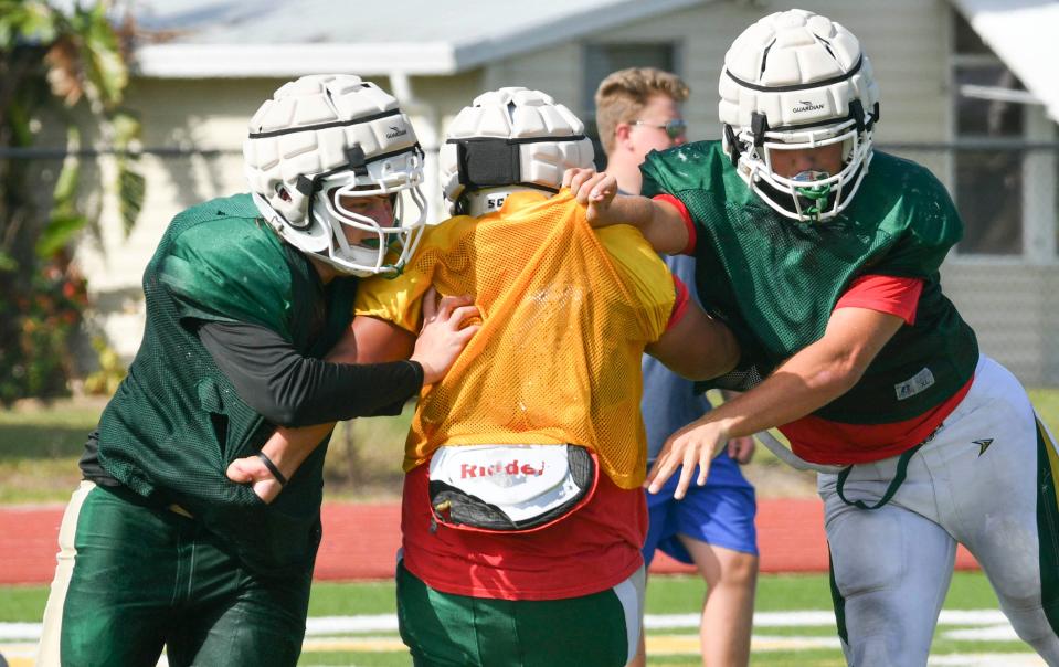 The Melbourne Central Catholic football team runs through plays Wednesday, August 10, 2022 in preparation for their first game of the season. Craig Bailey/FLORIDA TODAY via USA TODAY NETWORK