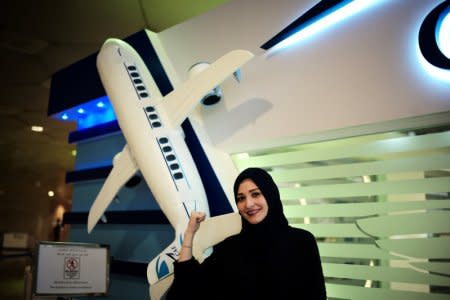 Dalia Yashar, one of the first Saudi students who registered to become a commercial pilot, stands in front of the registration centre, CAE Oxford ATC, where Saudi women can pursue their carrier as a commercial pilots, at King Fahd International Airport in Dammam, Saudi Arabia, July 15, 2018. REUTERS/Hamad I Mohammed