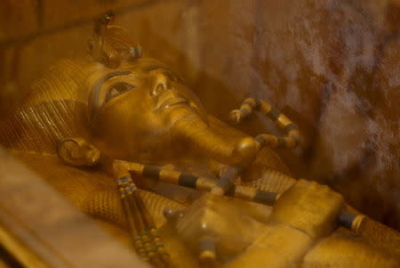 The golden sarcophagus of King Tutankhamun in his burial chamber is seen in the Valley of the Kings, in Luxor, Egypt, November 28, 2015. REUTERS/Mohamed Abd El Ghany