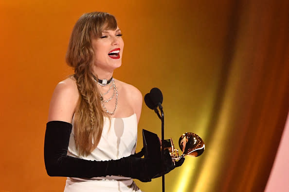 TOPSHOT – US singer-songwriter Taylor Swift accepts the Best Pop Vocal Album award for “Midnights” on stage during the 66th Annual Grammy Awards at the Crypto.com Arena in Los Angeles on February 4, 2024. (Photo by Valerie Macon / AFP) (Photo by VALERIE MACON/AFP via Getty Images)