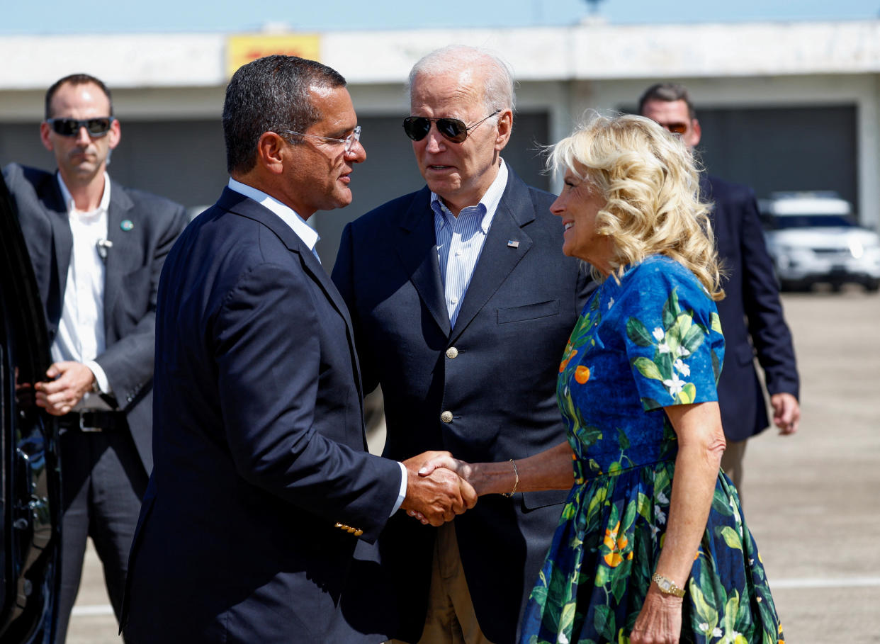 Puerto Rico Gov. Pedro Pierluisi greets President Biden and first lady Jill Biden at Mercedita International Airport in Ponce, Puerto Rico, on Monday. 