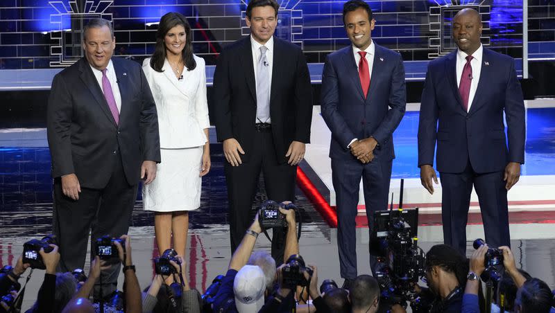 Former New Jersey Gov. Chris Christie, former United Nations Ambassador Nikki Haley, Florida Gov. Ron DeSantis, businessman Vivek Ramaswamy and Sen. Tim Scott, R-S.C., stand on stage before a Republican presidential primary debate on Nov. 8, 2023, in Miami.