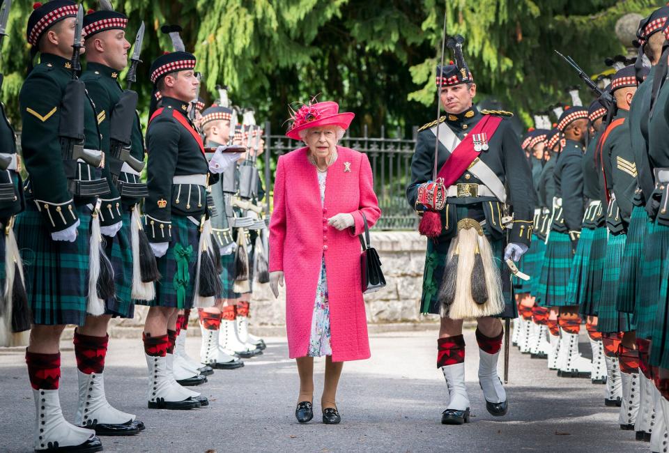Queen Elizabeth II during an inspection of the Balaklava Company, 5 Battalion The Royal Regiment of Scotland at the gates at Balmoral, as she takes up summer residence at the castle, on August 9, 2021 in Ballater, Aberdeenshire.