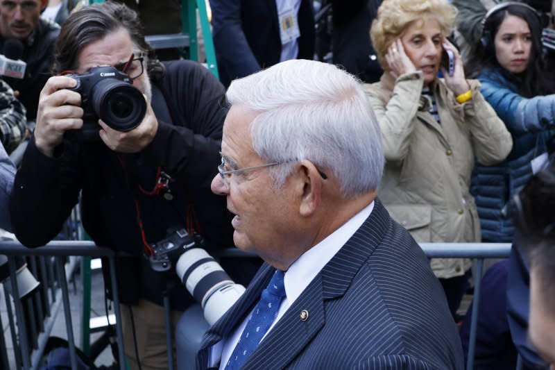 Democratic New Jersey Sen. Robert Menendez exits Federal Court after pleading not guilty on bribery and extortion charges in September. A judge released his motion to have the charges dropped Thursday. File Photo by John Angelillo/UPI