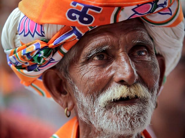 A farmer takes part in a sit-in protest organised by India's main opposition Bharatiya Janata Party (BJP) against what they said were illegal land acquisitions by the government to be given to private companies at a low price, in New Delhi August 3, 2011. REUTERS/Adnan Abidi