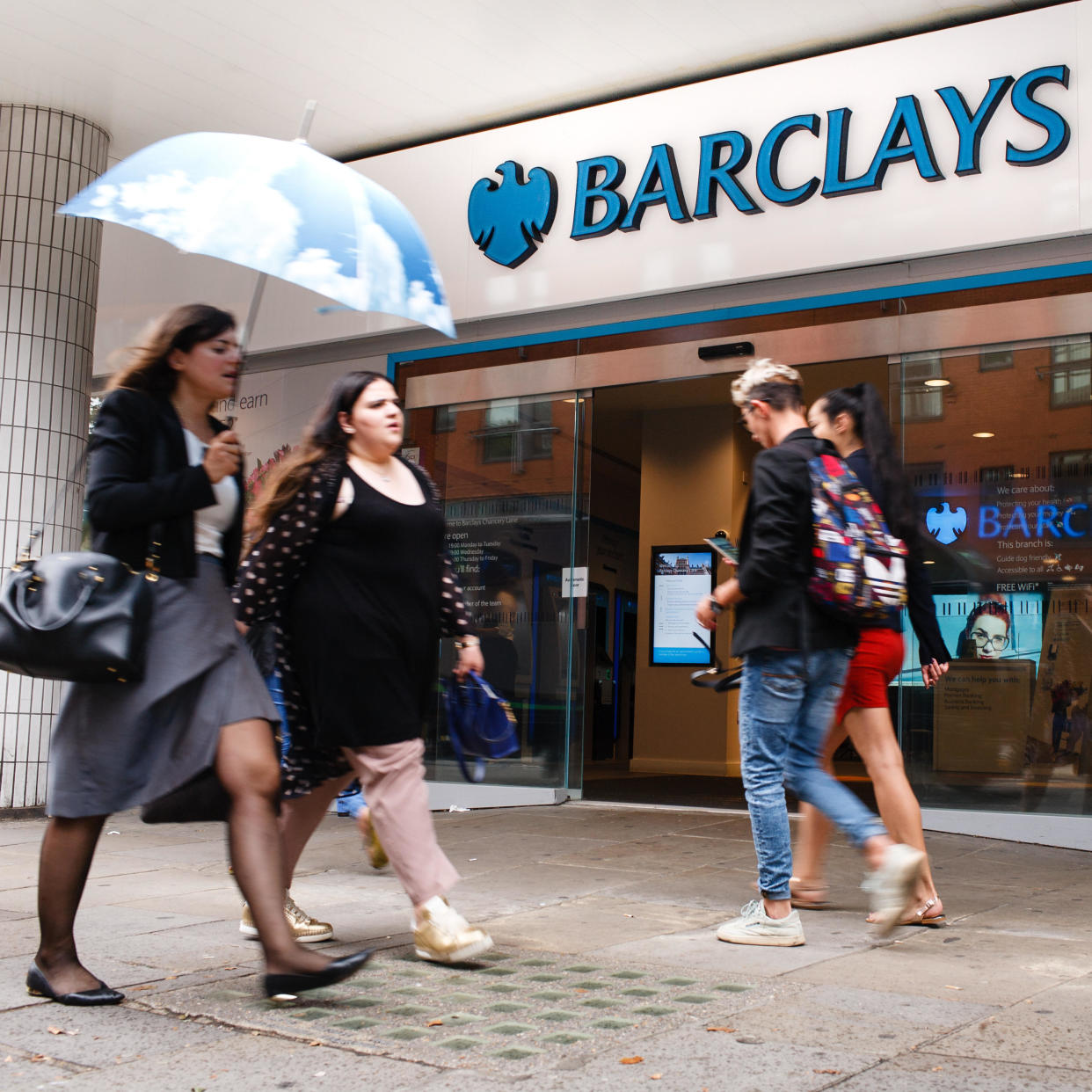 July 26, 2019, London, United Kingdom: People walk past a branch of Barclays bank on High Holborn in central London. Four major UK banks, including Barclays, are set to release interim figures over the coming days. Half-year results for Lloyds Banking Group are due out on July 31, for Barclays on August 1, for the Royal Bank of Scotland (RBS) on August 2 and for HSBC on August 5. Credit: David Cliff/SOPA Images/ZUMA Wire/Alamy Live News