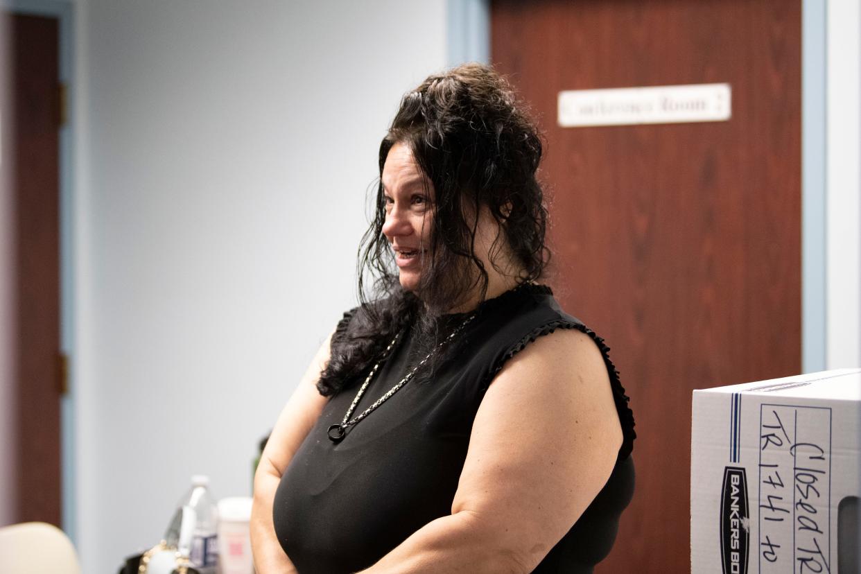 Defendant’s ex-wife and witness April Atkins is seen in the conference room outside the courtroom during the preliminary hearing for Robert Atkins who is accused in the 1991 murder and arson of Joy Hibbs, 35, of Bristol Township on Wednesday, Sept. 21, 2022. A cold case that led to an arrest of the long-time suspect in May.