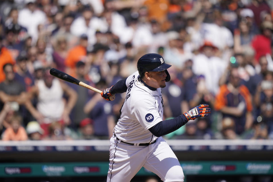 Detroit Tigers designated hitter Miguel Cabrera connects for a single during the sixth inning of the first baseball game of a doubleheader against the Colorado Rockies, Saturday, April 23, 2022, in Detroit. (AP Photo/Carlos Osorio)