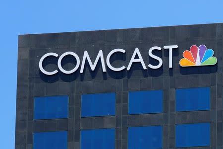 FILE PHOTO: The Comcast NBC logo is shown on a building in Los Angeles, California, U.S. June 13, 2018. REUTERS/Mike Blake