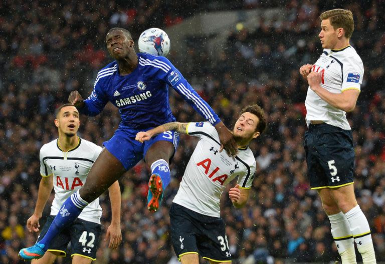 Chelsea's French defender Kurt Zouma (2nd L) vies with Tottenham Hotspur's English midfielder Ryan Mason (2nd L) during the English League Cup Final football match at Wembley Stadium in north London on March 1, 2015