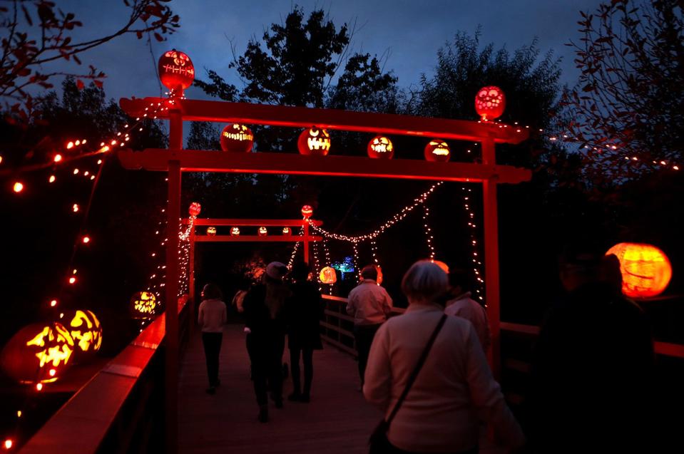 Guests arrive to check out the Roger Williams Park Zoo Jack-O-Lantern Spectacular. The Halloween event broke a record for attendance this year, helping the zoo break an overall attendance record in 2022, the zoo has announced.