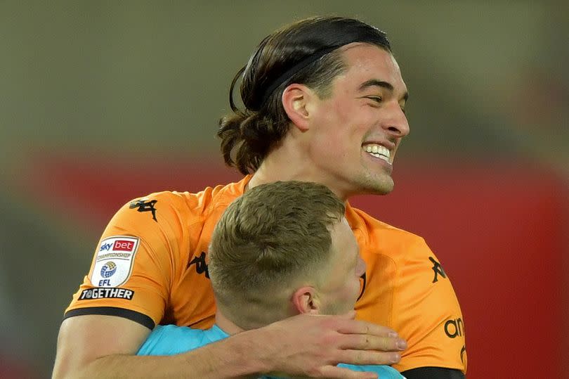 Jacob Greaves celebrates with goalkeeper Ryan Allsop