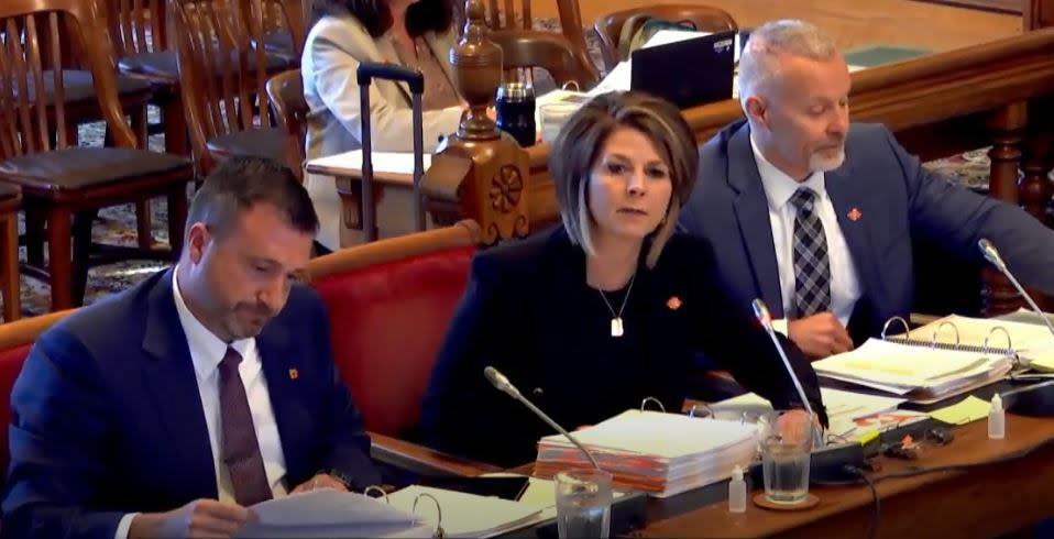 N.B. Power President Lori Clark and Vice presidents Brad Coady (left) and Darren Murphy (right) made an appearance in front of the Legislature's Public Accounts Committee Monday