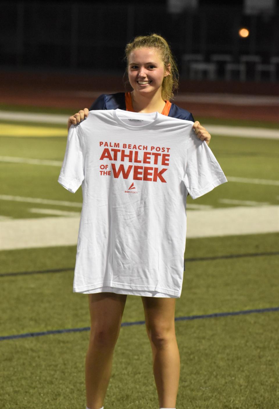 Benjamin's Madison Jayson is pictured holding her Athlete of the Week shirt on Mar. 14, 2024.