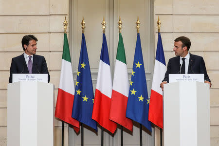 French President Emmanuel Macron and Italian Prime Minister Giuseppe Conte attend a joint news conference at the Elysee Palace in Paris, France, June 15, 2018. Ludovic Marin/Pool via Reuters