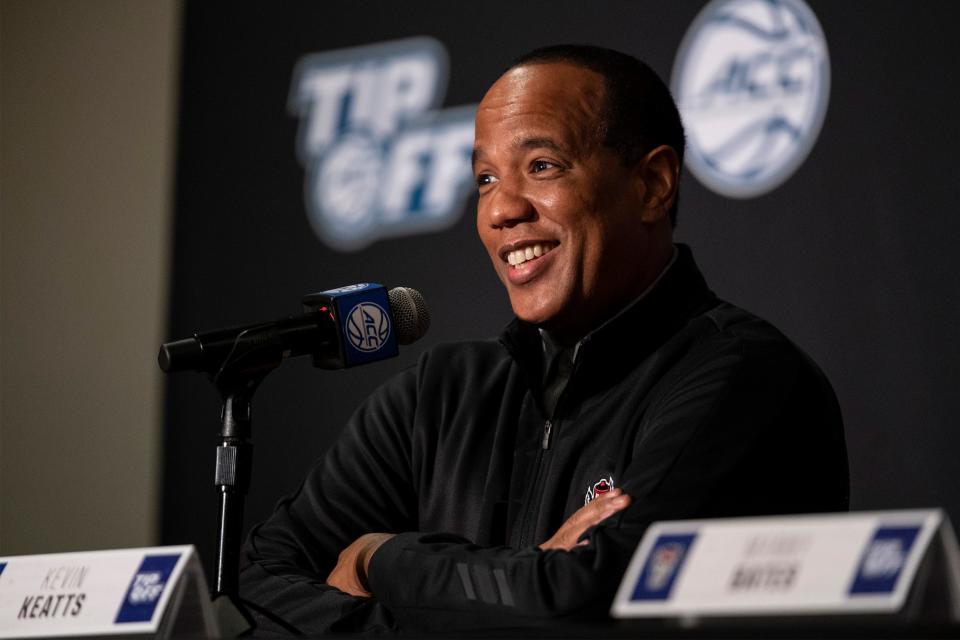 North Carolina State head coach Kevin Keatts smiles during NCAA college basketball Atlantic Coast Conference media day, Tuesday, Oct. 12, 2021, in Charlotte, N.C.