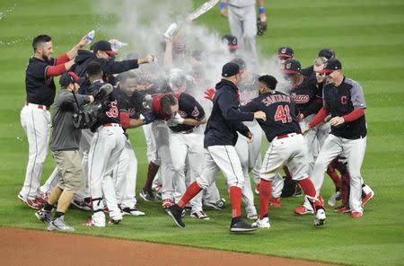 Sep 14, 2017; Cleveland, OH, USA; The Cleveland Indians celebrate their 10-inning win over the Kansas City Royals at Progressive Field. Mandatory Credit: David Richard-USA TODAY Sports
