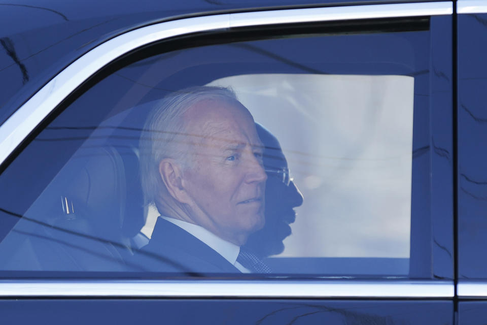 President Joe Biden, left, and Sen. Raphael Warnock, D-Ga., right, leave Ebenezer Baptist Church after a service honoring Martin Luther King Jr. Sunday, Jan. 15, 2023, in Atlanta. (AP Photo/Alex Slitz)