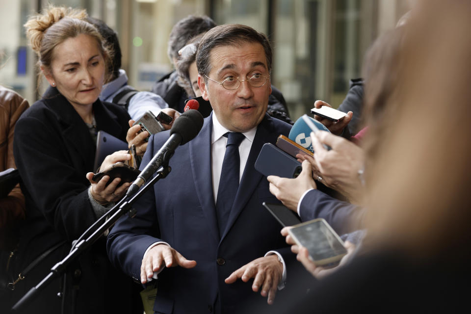 Spain's Foreign Minister Jose Manuel Albares Bueno speaks with the media outside EU headquarters in Brussels, Friday, April 12, 2024. British and Spanish foreign ministers are scheduled to meet Friday with a top European Commission official for another round of negotiations over the status of the disputed territory of Gibraltar following Britain's exit from the European Union. (AP Photo/Omar Havana)