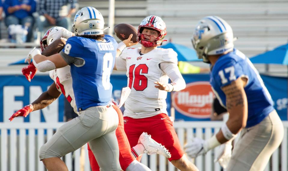 Western Kentucky quarterback Austin Reed (16) throws a pass against Middle Tennessee State during an NCAA college football game Saturday, Oct. 15, 2022, in Murfreesboro, Tenn. (Grace Ramey/Daily News via AP)