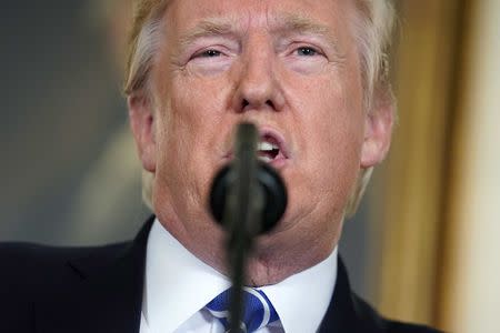 U.S. President Donald Trump speaks about his recent trip to Asia in the Diplomatic Room of the White House in Washington, U.S., November 15, 2017. REUTERS/Joshua Roberts