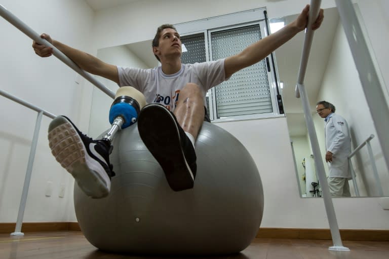 Jakson Follmann, reserve goalie for Brazilian team Chapecoensea, has taken his first steps, but after several operations and weeks in hospital every step is painful