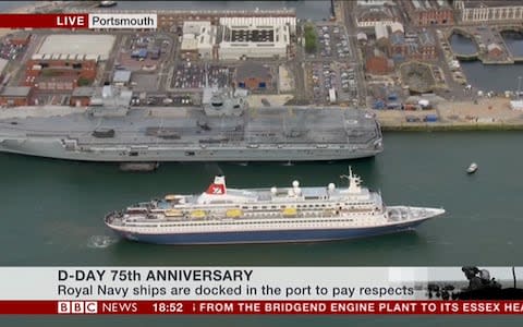 The MV Boudicca passes the HMS Queen Elizabeth - Credit: BBC