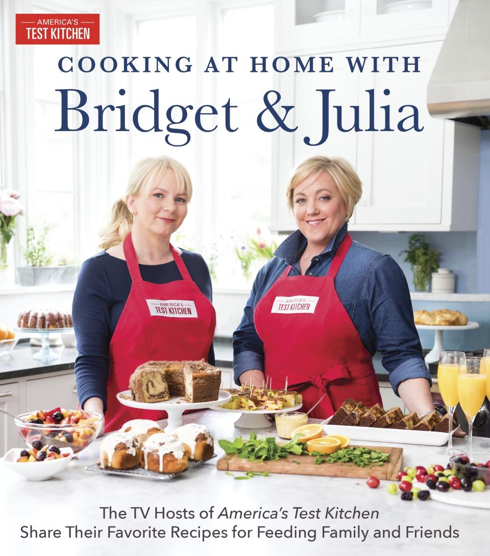 This image provided by America's Test Kitchen in October 2018 shows the cover for the cookbook “Cooking at Home with Bridget and Julia.” It includes a recipe for creamy cauliflower soup. (America's Test Kitchen via AP)